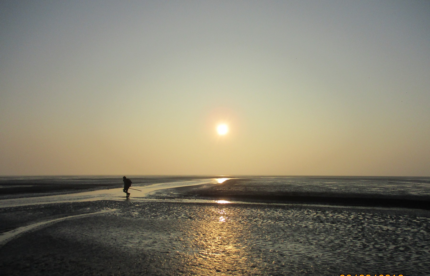 Het Wad bij zonsondergang